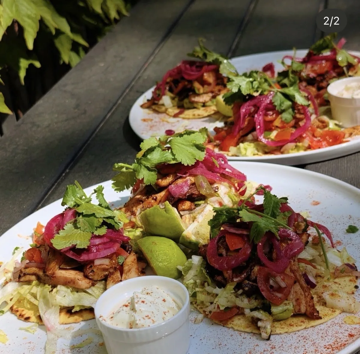Spiced chicken flatbread tacos with pickled onion
