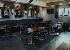 Warm indoor café setting for a coffee tasting